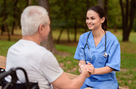 Healthcare-worker-with-Patient.jpg